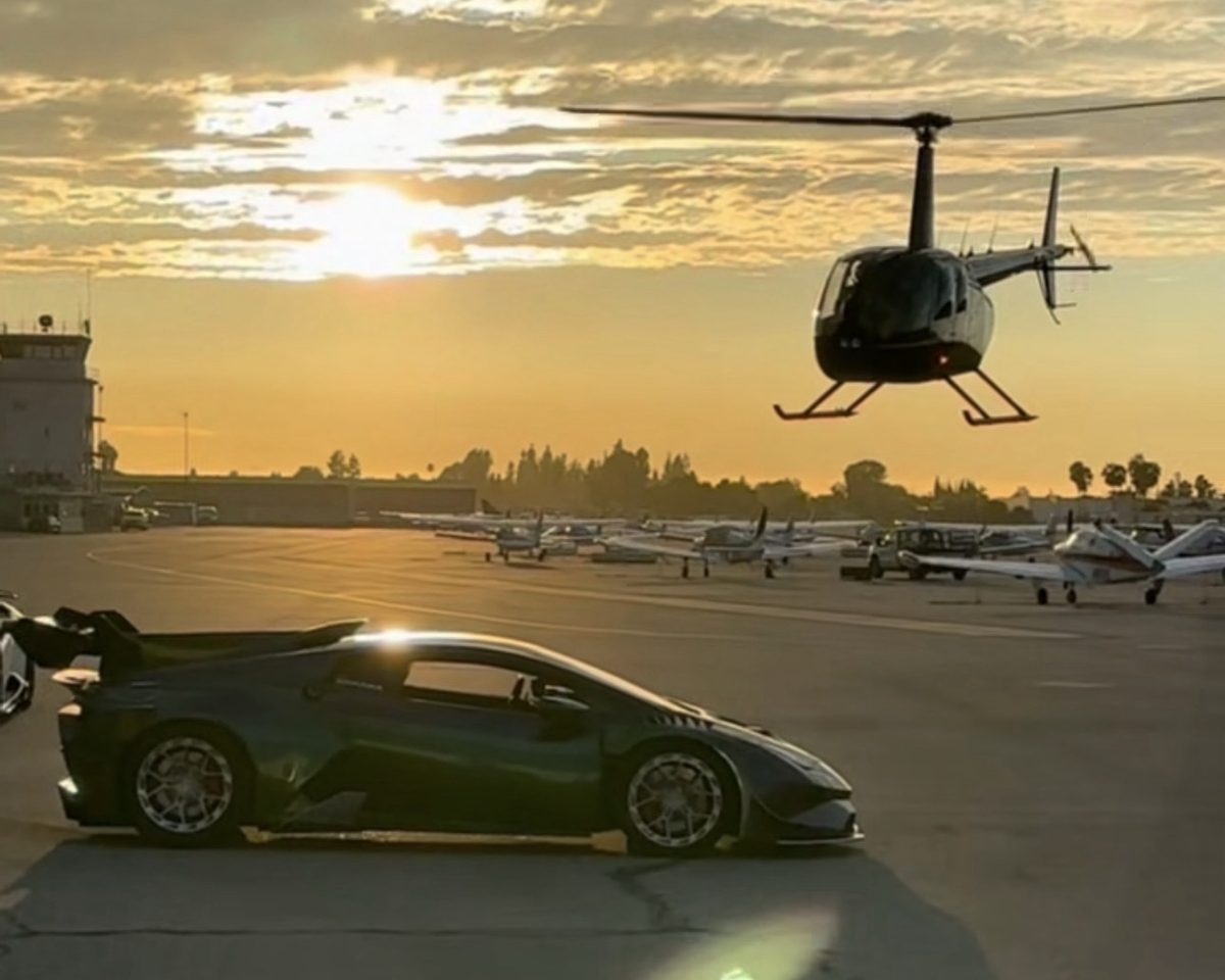 Helicopter lifting off over a Lambo at sunset for the Str8Up GFI Join the Room application page.